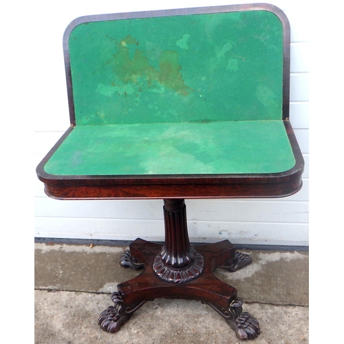 687 - A 19th cen rosewood foldover card table on paw feet, missing parts of feet, 92cm wide