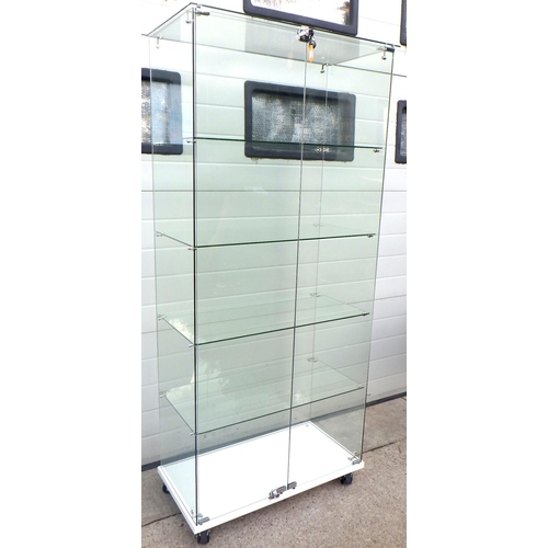 688 - A tall glass display cabinet, 81cm wide, 178cm tall