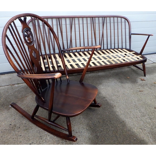 722 - A dark Ercol three seater settee frame together with a rocking chair frame (2)