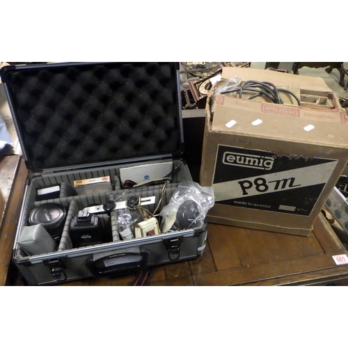 786 - A camera case and contents together with a Eumig projector