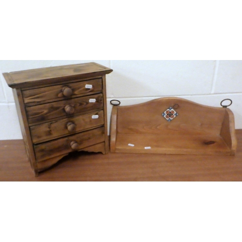 811 - A miniature chest of drawers together with a shelf (2)