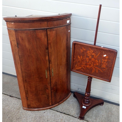 832 - A walnut hanging corner cupboard a/f together with a pole screen (2)