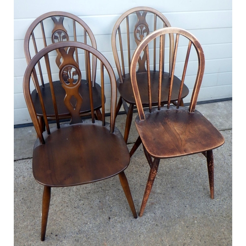 836 - Three Ercol fleur de lys dining chairs together with a further Ercol chair (4)