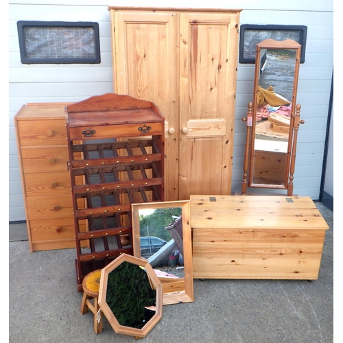 840 - A pine wardrobe, cheval mirror, chest, blanket box, stool, mirrors, wine rack