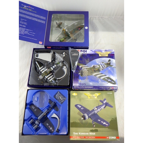 129 - Two Corgi Aviation Archive planes together with two Oxford planes and a HM plane (5) 
All models hav... 