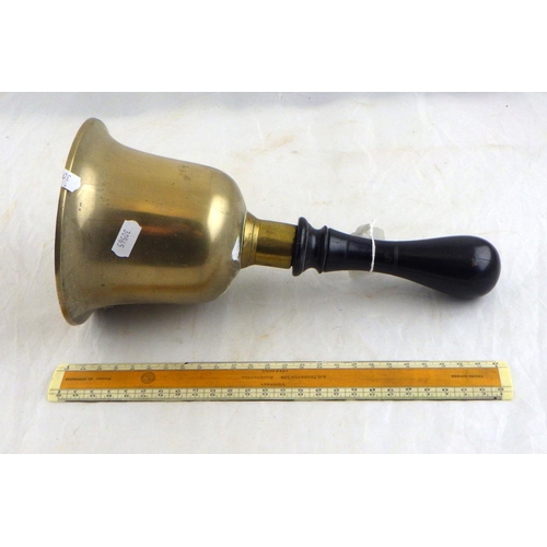 170 - A brass handbell having a turned hardwood handle  30cm tall