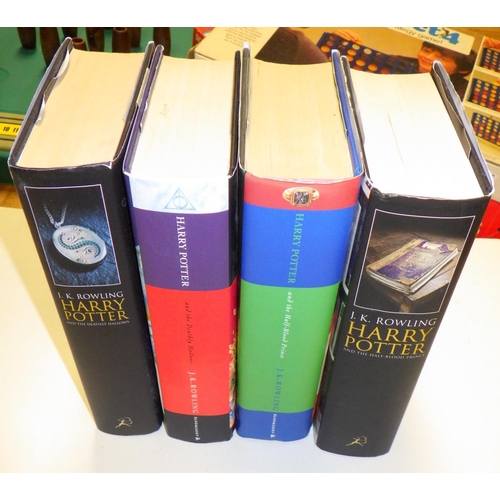 242 - Four Harry Potter books