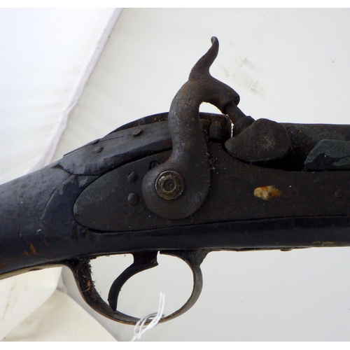 260 - An English sporting gun the lock plate bearing a brass tag 