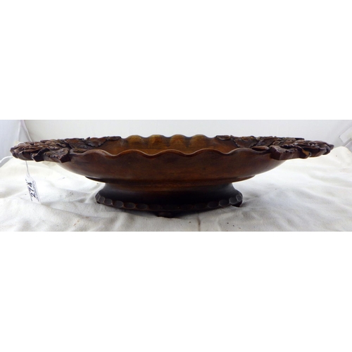 274 - A Black Forest style carved musical bowl