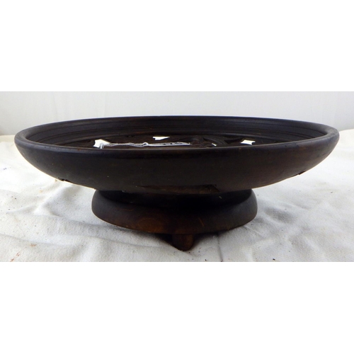 275 - A Black Forest style carved musical circular bowl