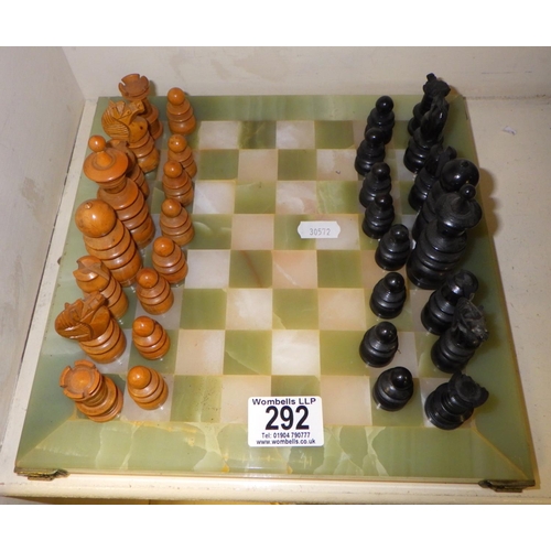 292 - A chess set on a onyx board AF