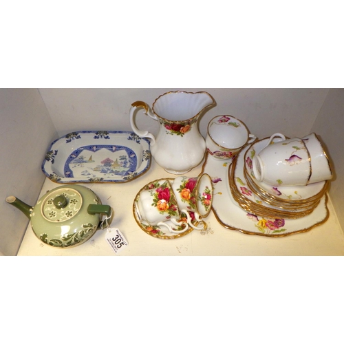 305 - A James Macintyre Gesso Faience tea pot together with various Royal Albert and a Copeland bowl (qty)