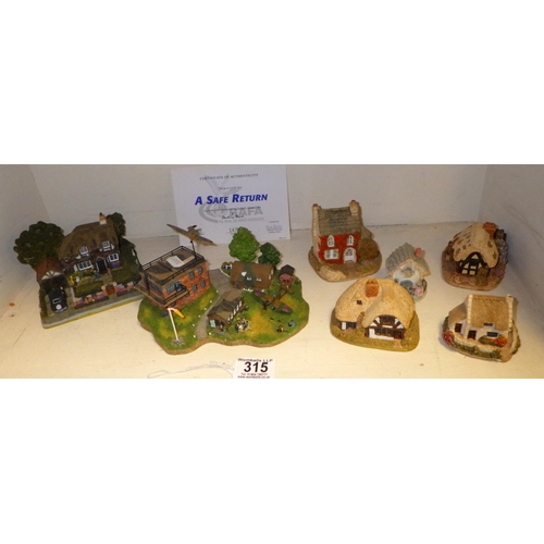 315 - A group of various cottages etc to include Danbury Mint, Lilliput lane etc