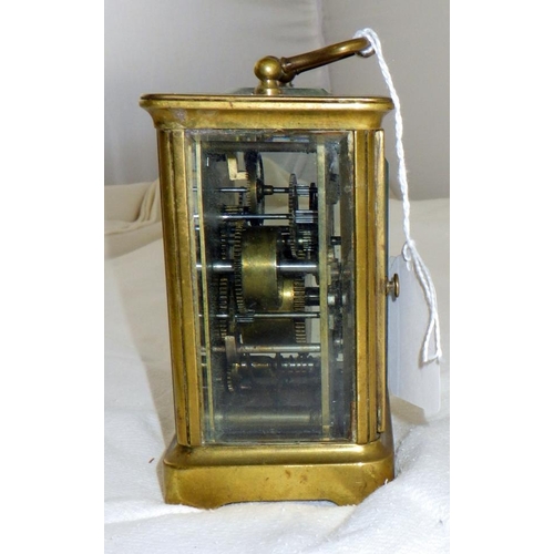 317 - A striking brass cased carriage clock AF