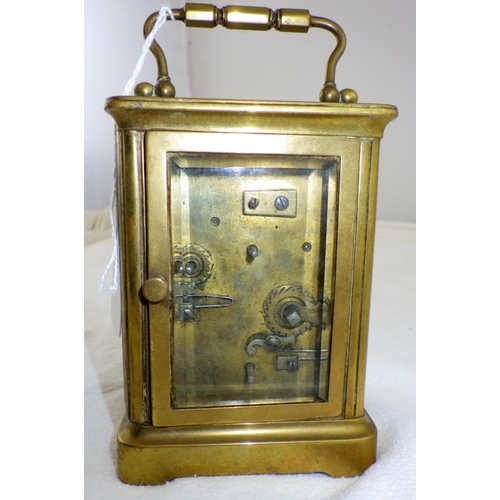 317 - A striking brass cased carriage clock AF