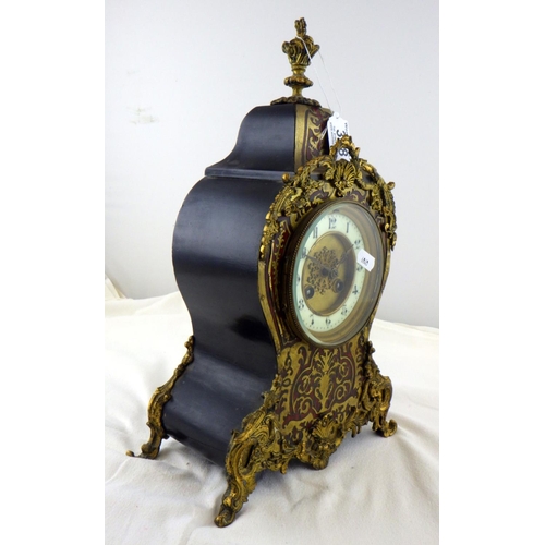 318 - A Boulle Gilt mantle clock