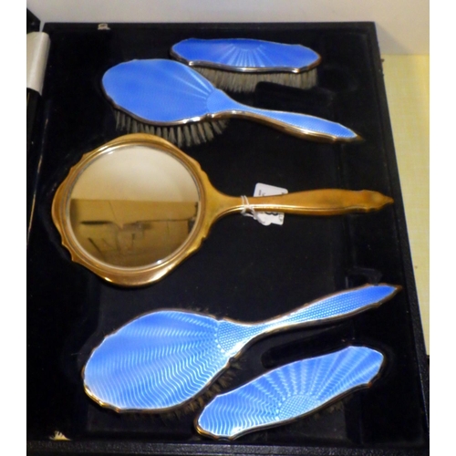 353 - A boxed enamel brush set, worn