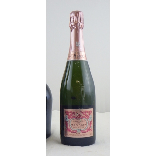 56 - Cuvee Rose - Champagne - Laurent-Perrier, three 0.75lt bottles; Champagne Rose - Oeil de Peredrix, a... 