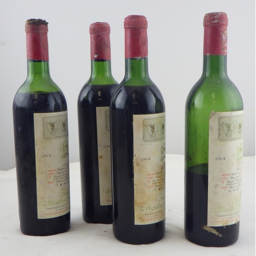 60 - Chateau Mouton Rothschild 1964, three bottles 0.75lt; another bottle, sealed but of very low level. ... 