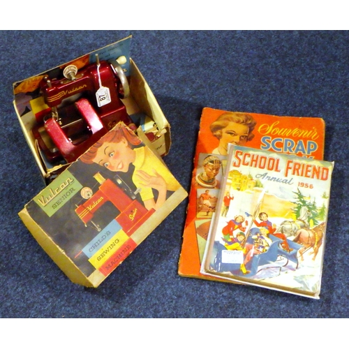 87 - A Vulcan child's sewing machine with box AF together with a scrap book and a School Friend annual 19... 