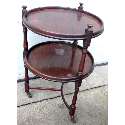 758 - A 20thC mahogany circular trolley