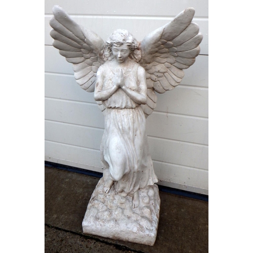 781 - A Fibreglass angel together with two small tables af