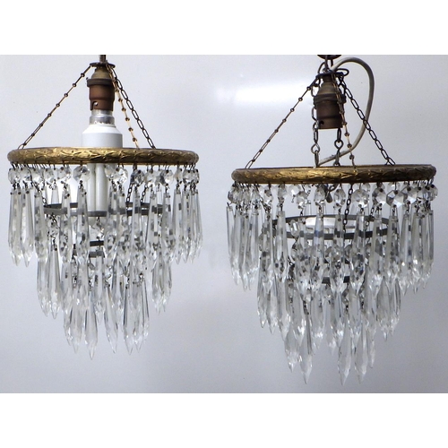 783 - A Pair of three tier crystal glass chandeliers af
 The Estate of Mr Darrell Buttery