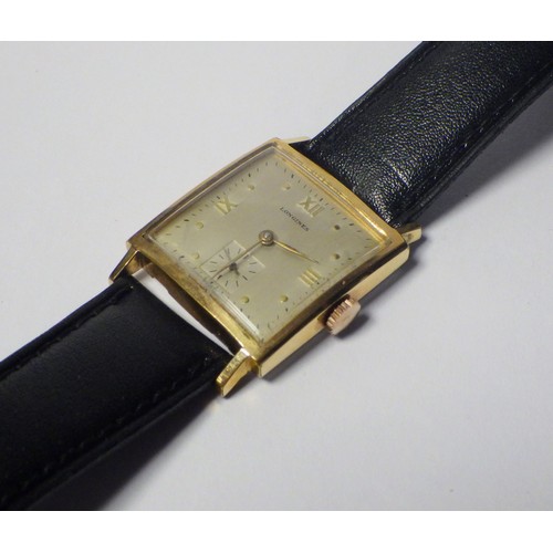 53 - A Longines wristwatch having a Longines cal. 23M manual wind movement in a square gold plated case h... 