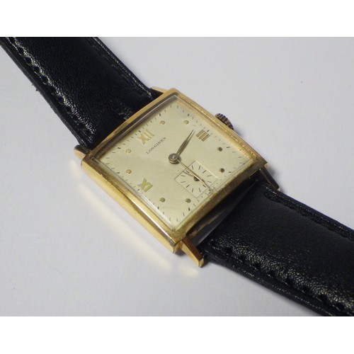 53 - A Longines wristwatch having a Longines cal. 23M manual wind movement in a square gold plated case h... 