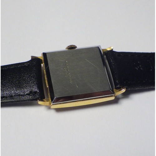 53 - A Longines wristwatch having a Longines cal. 23M manual wind movement in a square gold plated case h... 