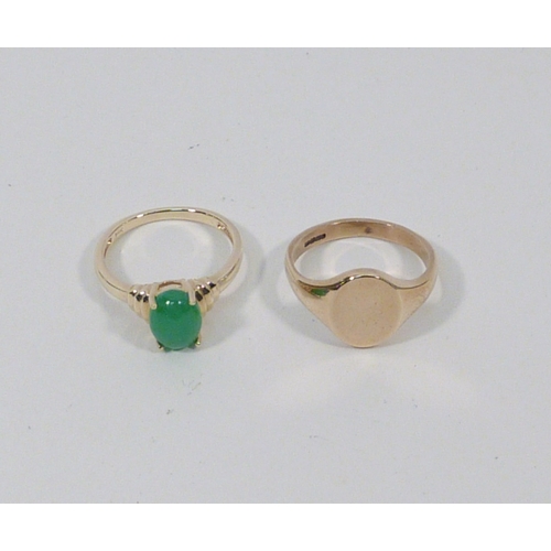 13 - A 9ct gold signet ring, 3gr; a ring set with a green stone, yellow metal marked 14k. (2)