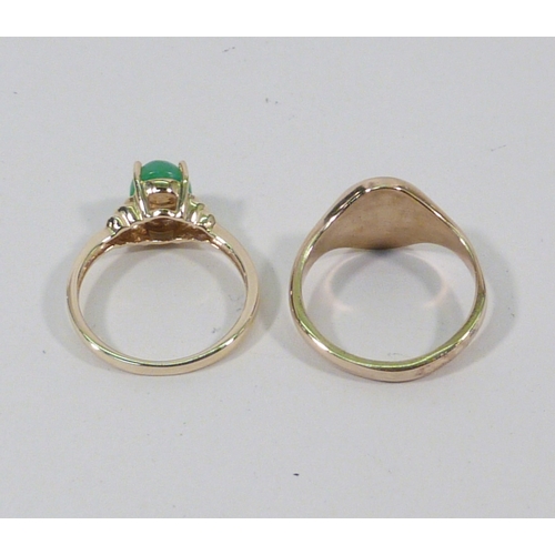 13 - A 9ct gold signet ring, 3gr; a ring set with a green stone, yellow metal marked 14k. (2)