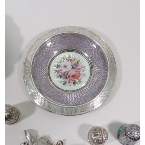 18 - Two silver shell-shaped dishes, an enamelled silver dish, two silver thimbles, 95gr; white metal inc... 