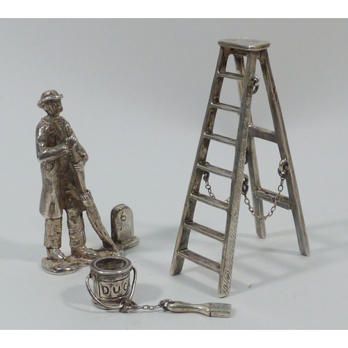 25 - A novelty miniature step ladder, silver later 20th cent, 72mm tall; a Cries of London miniature figu... 