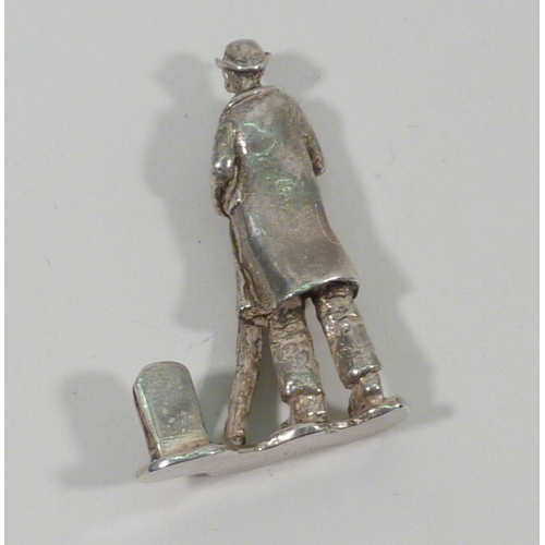 25 - A novelty miniature step ladder, silver later 20th cent, 72mm tall; a Cries of London miniature figu... 