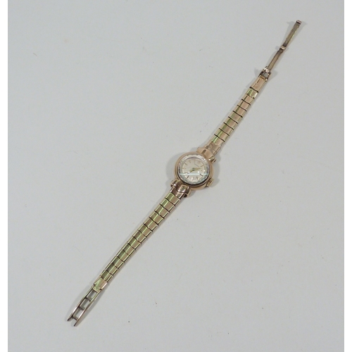 28 - An Omega ladies bracelet cocktail watch, 9ct gold having a manual wind movement.  17mm across head /... 