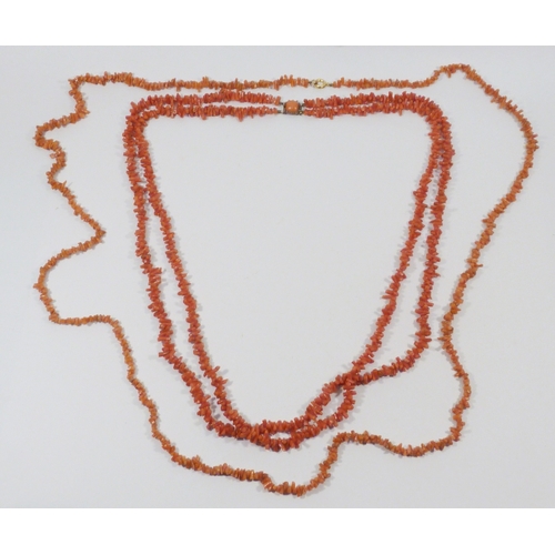 41 - A double strand necklace comprising irregular coral beads, the whole closing on a yellow metal clasp... 