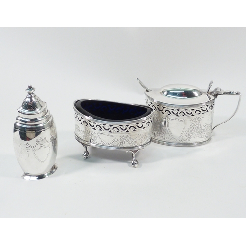 44 - A silver mustard pot  together with a matching salt, and pepper pot, early 20th cent in George III i... 