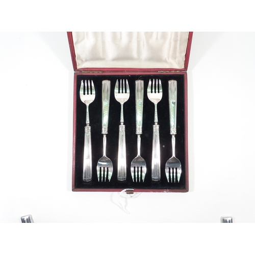 6 - A set of six Victorian silver cake forks, cased.  Each 140mm long; pair of silver salad servers, ear... 