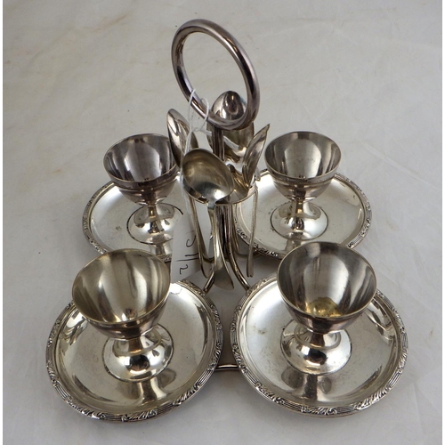 157 - A silver plated egg coddler together with an Aspreys silver plated egg cup breakfast stand with asso... 