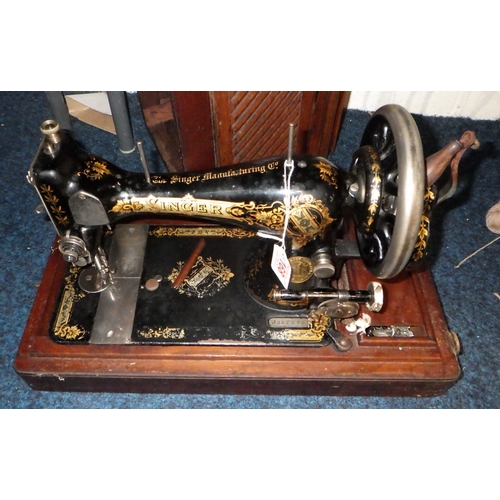 168 - A cased Singer sewing machine together with a Fassbender mid century handbag (2)