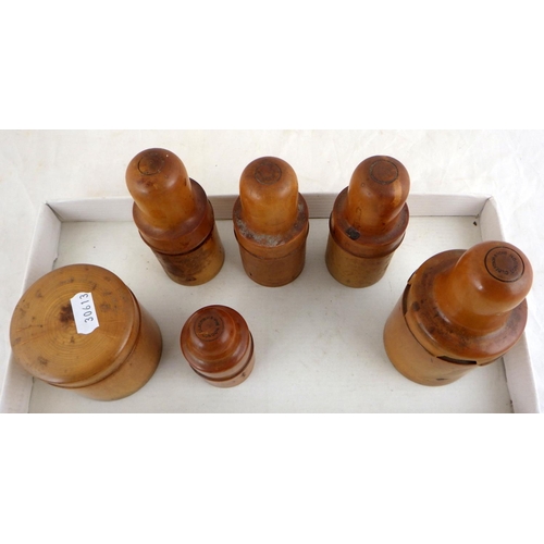 179 - A group of five 19thC turned boxwood medicinal bottle cases together with a similar turned lidded ba... 