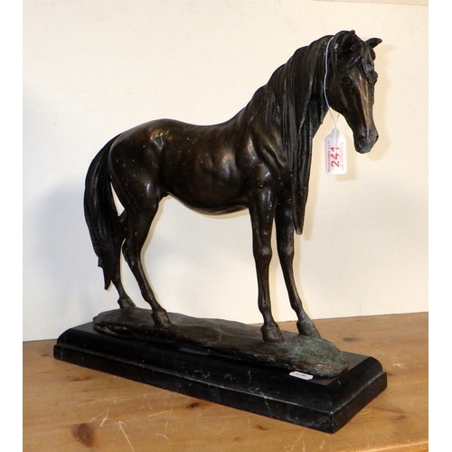 241 - A cast bronze figure of a horse on a marble base 39cm tall