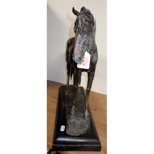 241 - A cast bronze figure of a horse on a marble base 39cm tall