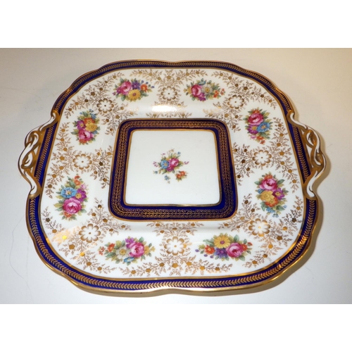 246 - An Edwardian Cauldon floral and gilt decoration on cobalt blue ground part tea set