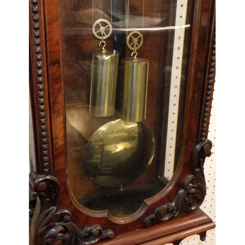 288 - A 19thC double weight Vienna wall clock 118cm long 37cm wide