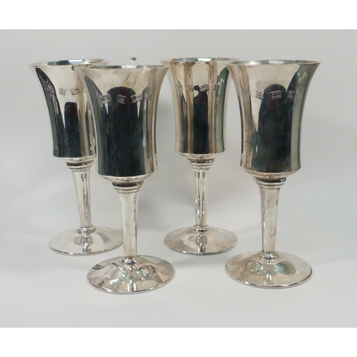 61 - A cased set of four silver goblets, late 20th cent.  Each 162mm tall / 590gr total