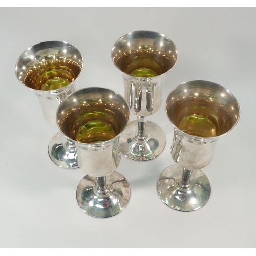 61 - A cased set of four silver goblets, late 20th cent.  Each 162mm tall / 590gr total