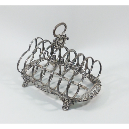 77 - A William IV silver toast rack, Howard, Battie & Hawksworth, Sheffield 1829.  Approx 180mm long/ 140... 