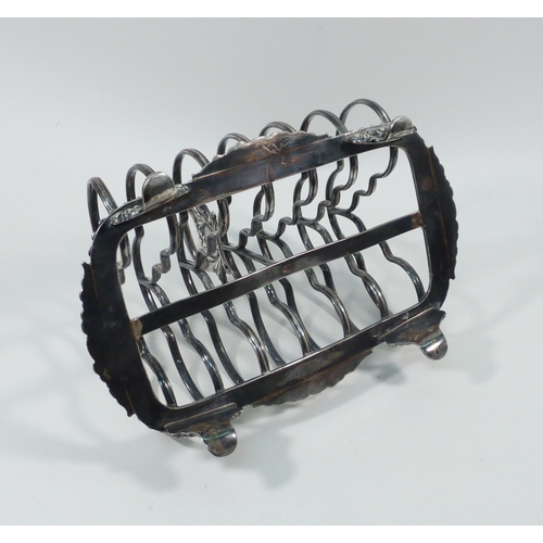 77 - A William IV silver toast rack, Howard, Battie & Hawksworth, Sheffield 1829.  Approx 180mm long/ 140... 